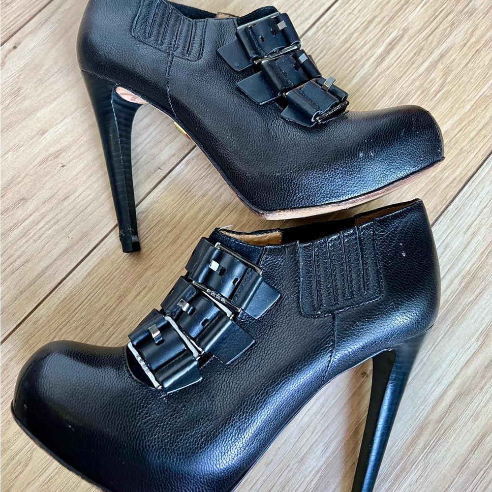 L.A.M.B. Black Stiletto Heels with Buckle Straps